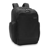 Briggs & Riley Baseline traveler backpack with multiple compartments, padded shoulder straps, and durable black fabric.