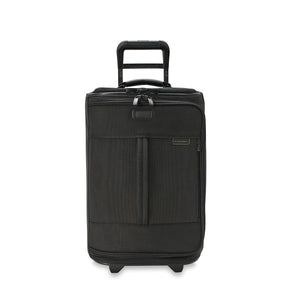 Briggs & Riley Baseline Global 2-Wheel Carry-On Duffle in blue with padded handle and wheels for easy travel.