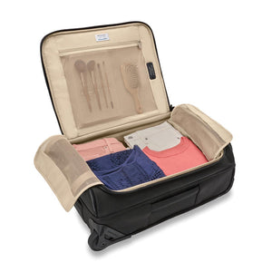 Briggs & Riley Baseline Global 2-Wheel Carry-On Duffle in blue with telescoping handle and two wheels for easy travel.