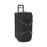 Briggs & Riley Baseline medium two-wheel duffle bag in blue fabric with sturdy handle and wheels for easy travel.