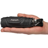 Black Davek Mini Umbrella open, compact design with sturdy handle, ideal for travel and everyday protection from rain.