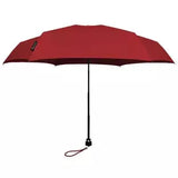Red Davek Mini Umbrella open, compact design with sturdy frame and canopy, ideal for travel and everyday use.