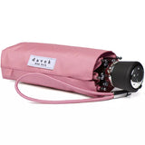 Pink Davek Mini Umbrella opened, showing compact design and sturdy canopy perfect for rainy weather.