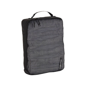 Eagle Creek PACK-IT™ Reveal Cube M with transparent compartments for organized packing and easy visibility.