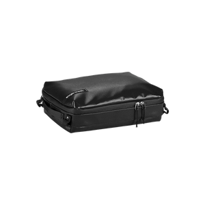 Eagle Creek PACK-IT™ Gear Cube M for packing organization, shown in black fabric with zipper closure and compact design.