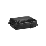 Eagle Creek PACK-IT™ Gear Cube M for packing organization, shown in black fabric with zipper closure and compact design.