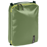 Eagle Creek PACK-IT™ Gear Cube M for packing organization, showing a compact, black travel gear cube with mesh top for visibility.