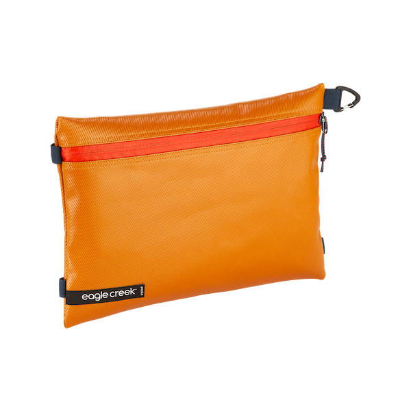 Eagle Creek PACK-IT™ Gear Pouch M for packing organization, shown open with compartments for travel essentials.