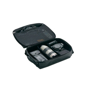 Eagle Creek PACK-IT Gear Protect-It Cube M for packing organization, shown in black with mesh top and zip closure.