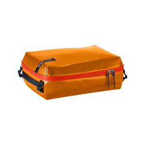 Eagle Creek PACK-IT Gear Protect-It Cube S for packing organization, shown in green with zipper closure and mesh top for visibility.