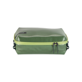 Eagle Creek PACK-IT Gear Protect-It Cube S used for packing organization, showing a compact, padded travel cube with multiple compartments.