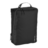 Eagle Creek PACK-IT™ Isolate Clean/Dirty Cube M for packing organization, showing a compact zippered travel cube with labeled compartments.