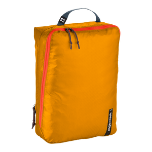 Eagle Creek PACK-IT™ Isolate Clean and Dirty Cube M for packing organization, showing a compact, organized travel cube with compartments.