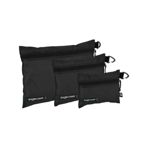 Eagle Creek PACK-IT Isolate Sac Set XS/S/M for packing organization, featuring multiple sizes in a compact, organized storage solution.