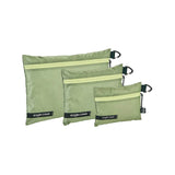 Eagle Creek PACK-IT Isolate Sac Set XS, S, M for packing organization, shown in assorted sizes with clear labeling and zipper closures.