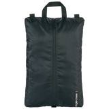 Eagle Creek PACK-IT™ Isolate Shoe Sac for packing organization, showing a black zippered shoe bag with logo detail.