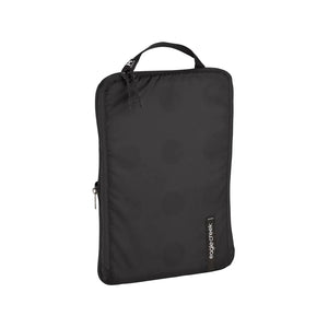 Eagle Creek PACK-IT™ Isolate Structured Folder M for packing organization, shown with neatly organized clothing and accessories.