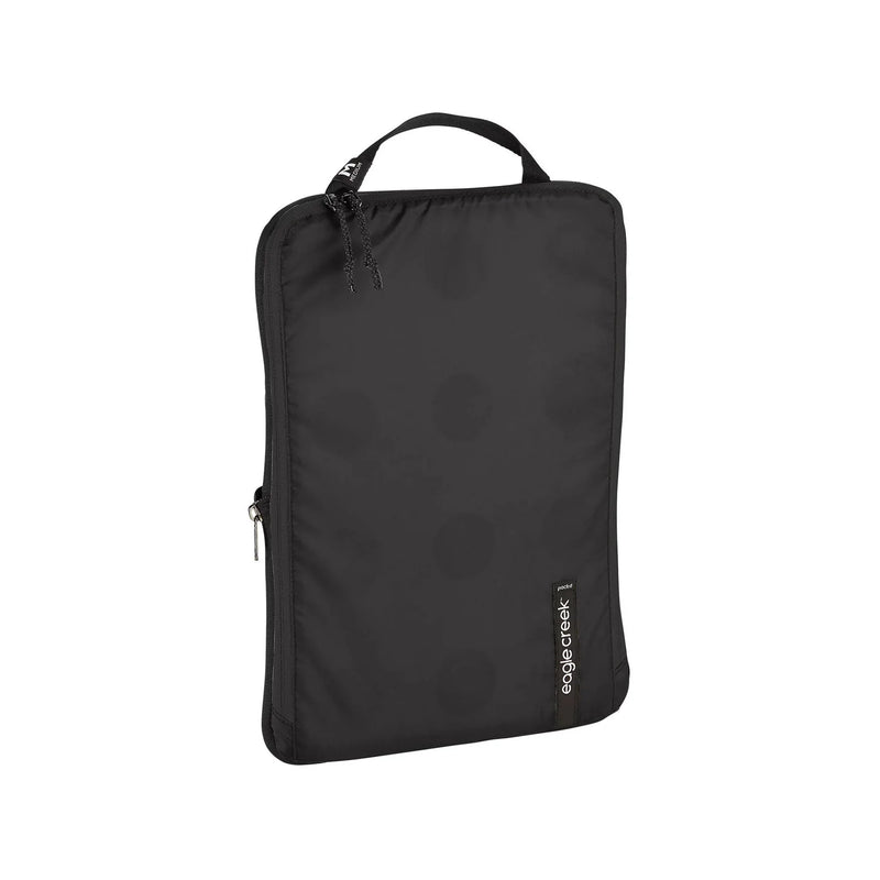 Eagle Creek PACK-IT™ Isolate Structured Folder M for packing organization, shown with neatly organized clothing and accessories.