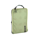 Eagle Creek PACK-IT™ Isolate Structured Folder M for packing organization, shown with neatly arranged documents and accessories.