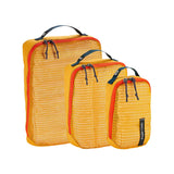 Eagle Creek PACK-IT™ Reveal Cube Set for packing organization, showing clear mesh cubes with clothing inside.