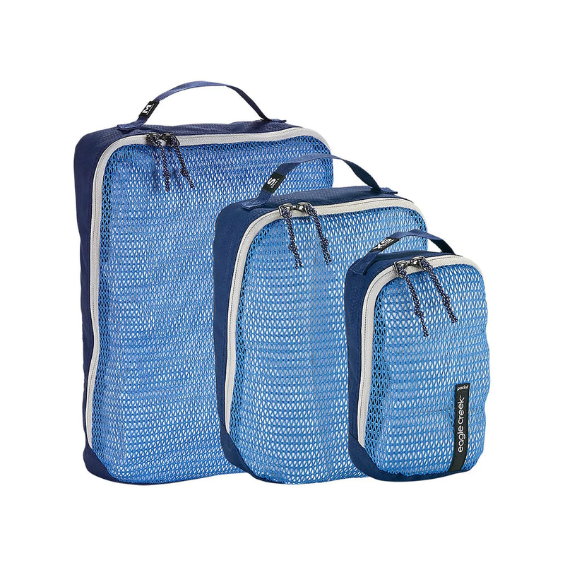 Eagle Creek PACK-IT Reveal Cube Set for packing organization, featuring multiple transparent cubes for easy item visibility.