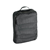 Eagle Creek PACK-IT Reveal Expansion Cube M for packing organization, showing mesh compartments and compact design for travel storage.