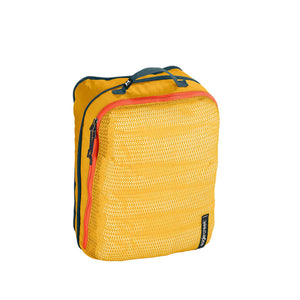 Eagle Creek PACK-IT Reveal Expansion Cube M for packing organization, showing a compact, lightweight travel cube with multiple compartments.
