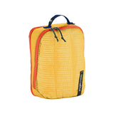 Eagle Creek PACK-IT™ Reveal Expansion Cube S for packing organization, shown open with compartments for clothes and accessories.