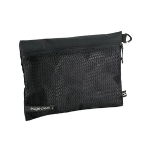 Eagle Creek PACK-IT™ Reveal Sac M for packing organization, shown with transparent compartments and compact design.