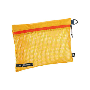 Eagle Creek PACK-IT™ Reveal Sac M for packing organization, shown with its compartments and transparent design for easy item visibility.
