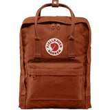 Fjallraven Kanken backpack in frost green with adjustable shoulder straps and front zipper pocket on a white background.
