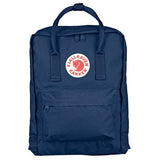 Fjallraven Kanken backpack in frost green with logo patch, showing front view with zipper compartments and adjustable shoulder straps.