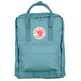 Fjallraven Kanken backpack in frosty green with top handle and adjustable shoulder straps, showcasing its compact, stylish design.