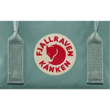 Fjallraven Kanken backpack in frosty green with dual shoulder straps and front zip pocket, stylish and durable for everyday use.