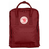 Fjallraven Kanken backpack in frost green with front zip pocket and carry handle, stylish and durable for everyday use
