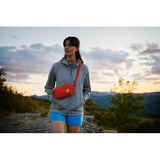 Green Fjallraven High Coast Hip Pack waist bag with adjustable strap and compact design for outdoor and everyday use.