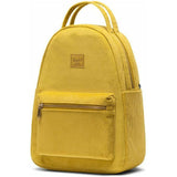 Small Herschel Nova backpack in tan corduroy fabric with adjustable shoulder straps and front pocket.