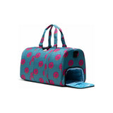 Herschel Novel Duffle bag featuring Simpsons design, with a spacious main compartment and adjustable shoulder strap.