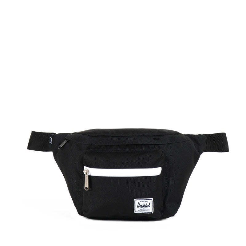 Herschel Seventeen hip pack in black with adjustable waist strap and multiple compartments for convenient storage.