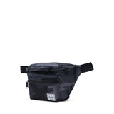 Herschel Seventeen Hip Pack waist bag in black with adjustable strap and front pocket, designed for convenient carrying.