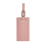 Pink personalized leather luggage tag by Index Urban, made in USA, featuring custom name embossing and durable leather material.