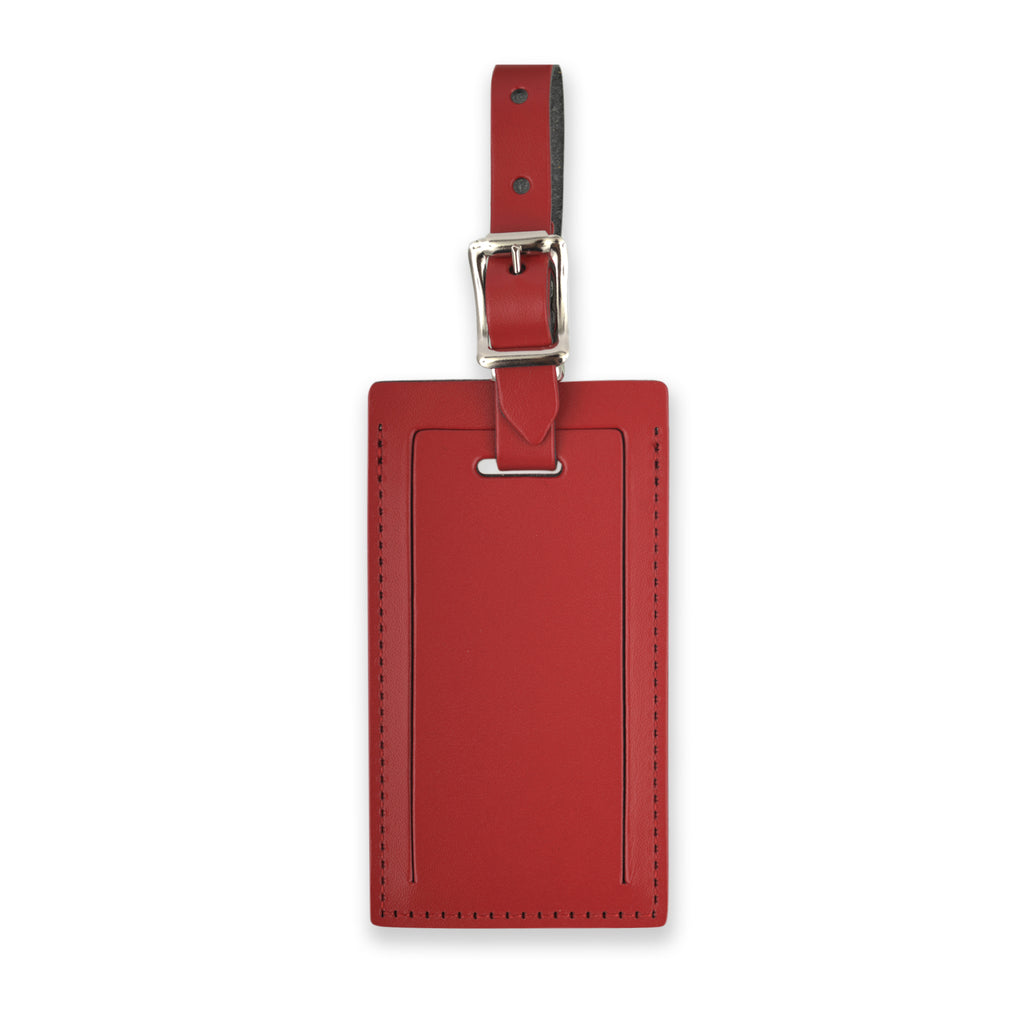 Red personalized leather luggage tag by Index Urban, made in USA, featuring clear ID window and adjustable strap for travel.