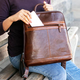 Jack Georges Voyager Adele Slim Backpack in brown leather, featuring multiple compartments and adjustable straps.