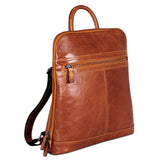 Jack Georges Voyager Adele Slim Backpack in honey leather with adjustable straps and multiple compartments.