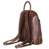 Brown Jack Georges Voyager small backpack with adjustable straps and front zip pocket, showing its compact, stylish design.