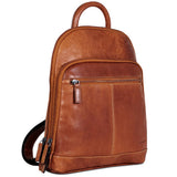 Jack Georges Voyager small backpack with leather accents and adjustable straps, shown from a three-quarter view.