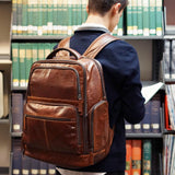 Brown Jack Georges Voyager Tech Backpack with multiple compartments, padded straps, and sleek design for everyday use.
