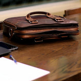 Brown Jack Georges Voyager Professional Zippered Briefcase with sleek design and multiple compartments for business essentials.