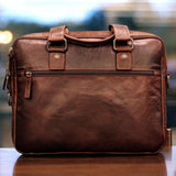 Brown Jack Georges Voyager Professional Zippered Briefcase with multiple compartments and sturdy leather construction.