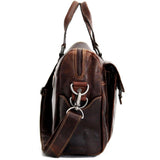 Brown Jack Georges Voyager zippered briefcase with front flap pocket, showing sturdy leather construction and sleek design.